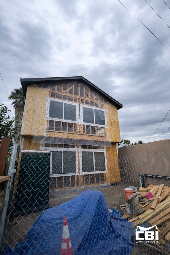 Two-story ADU framing and window install San Diego - Complete Builders Inc