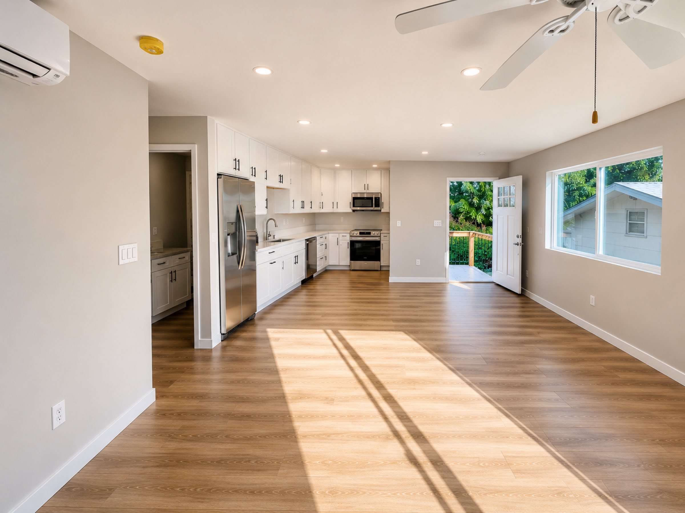 Completed sunroom addition open kitchen and living area San Diego - Complete Builders Inc