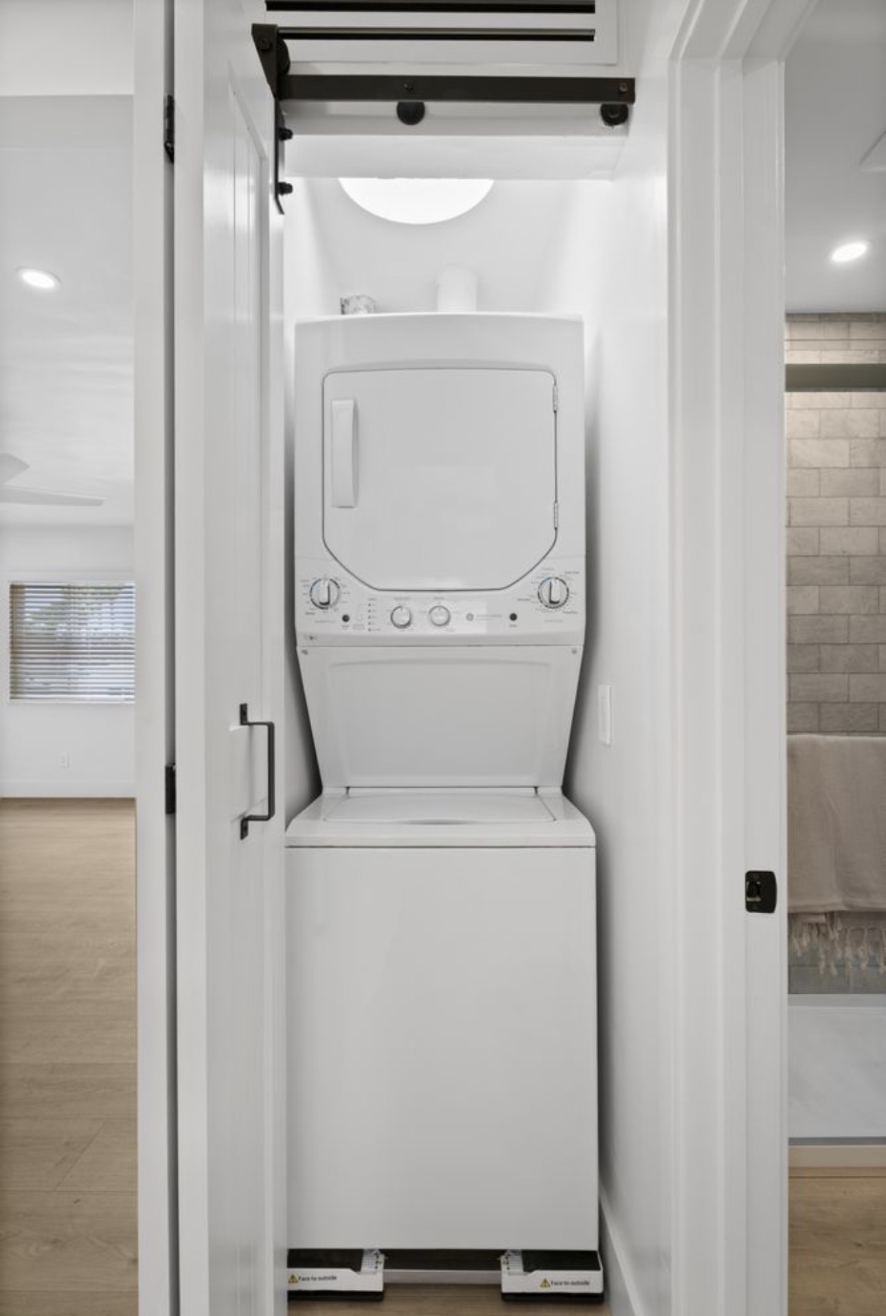 Apartment renovation in-unit stacked washer dryer San Diego - Complete Builders Inc