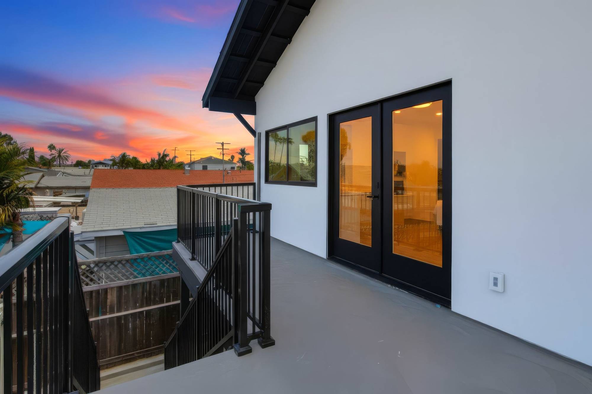 ADU rooftop deck at sunset with city view, San Diego