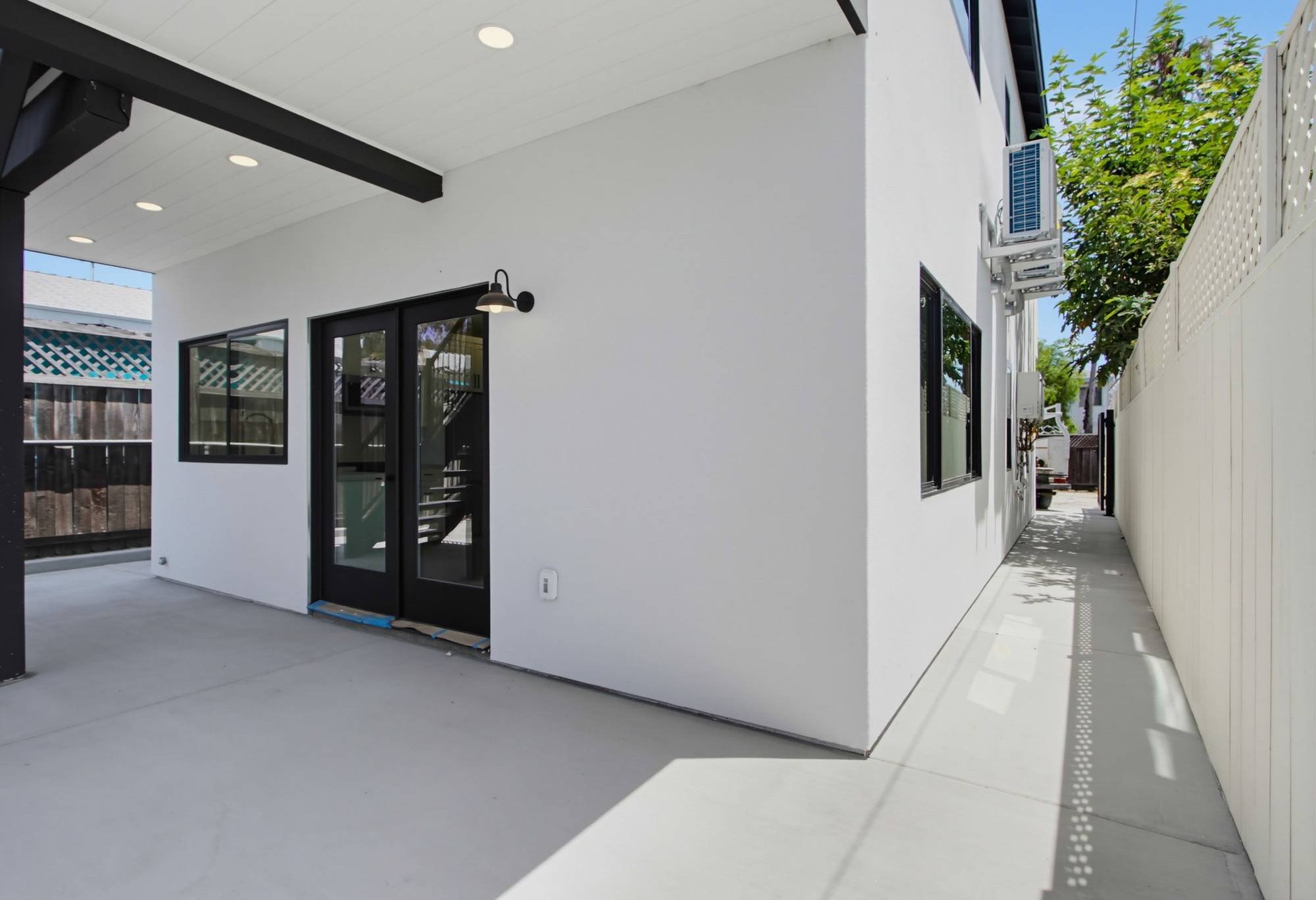 Two-story ADU covered patio and side entry passage, San Diego