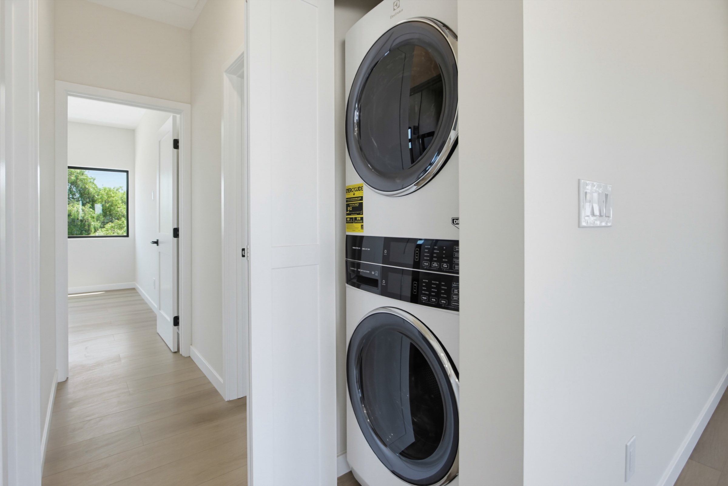 Two-story ADU in-unit stacked washer and dryer, San Diego