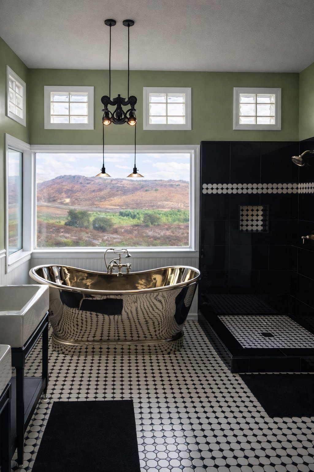 Luxury bathroom remodel gold freestanding tub San Diego - Complete Builders Inc