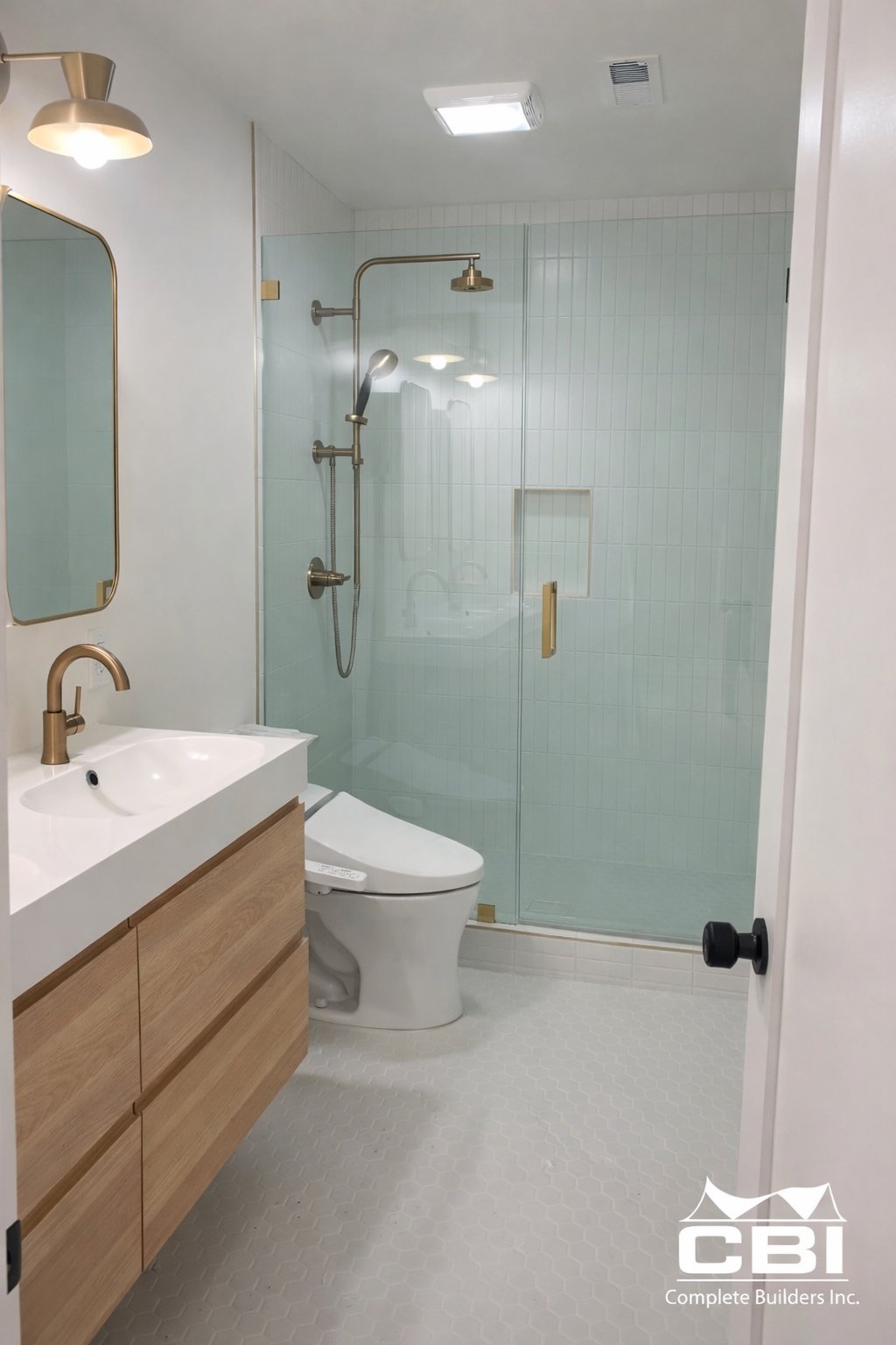 Modern bathroom remodel oak vanity glass shower San Diego - Complete Builders Inc