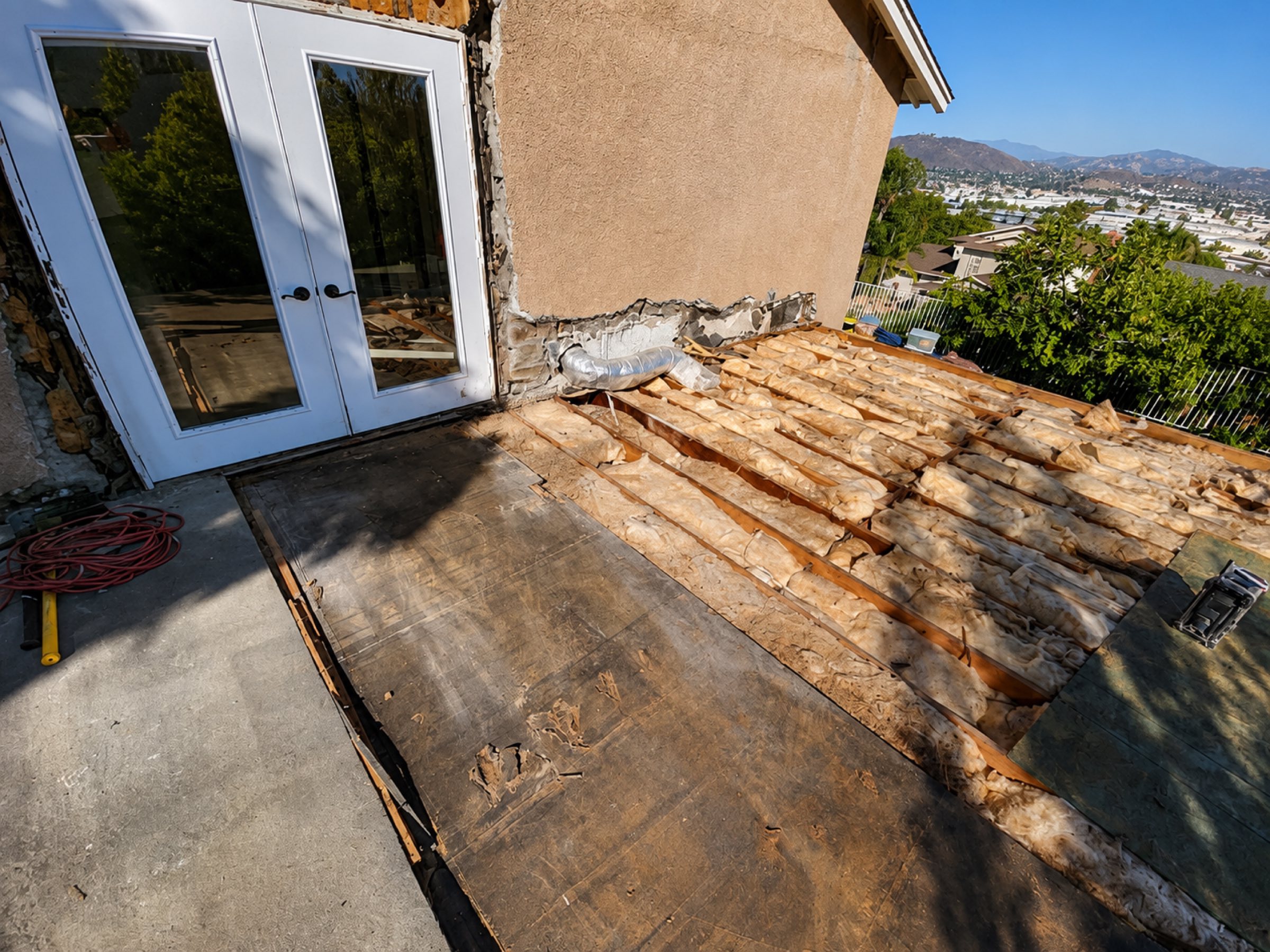 Rooftop deck subfloor and insulation before decking San Diego - Complete Builders Inc
