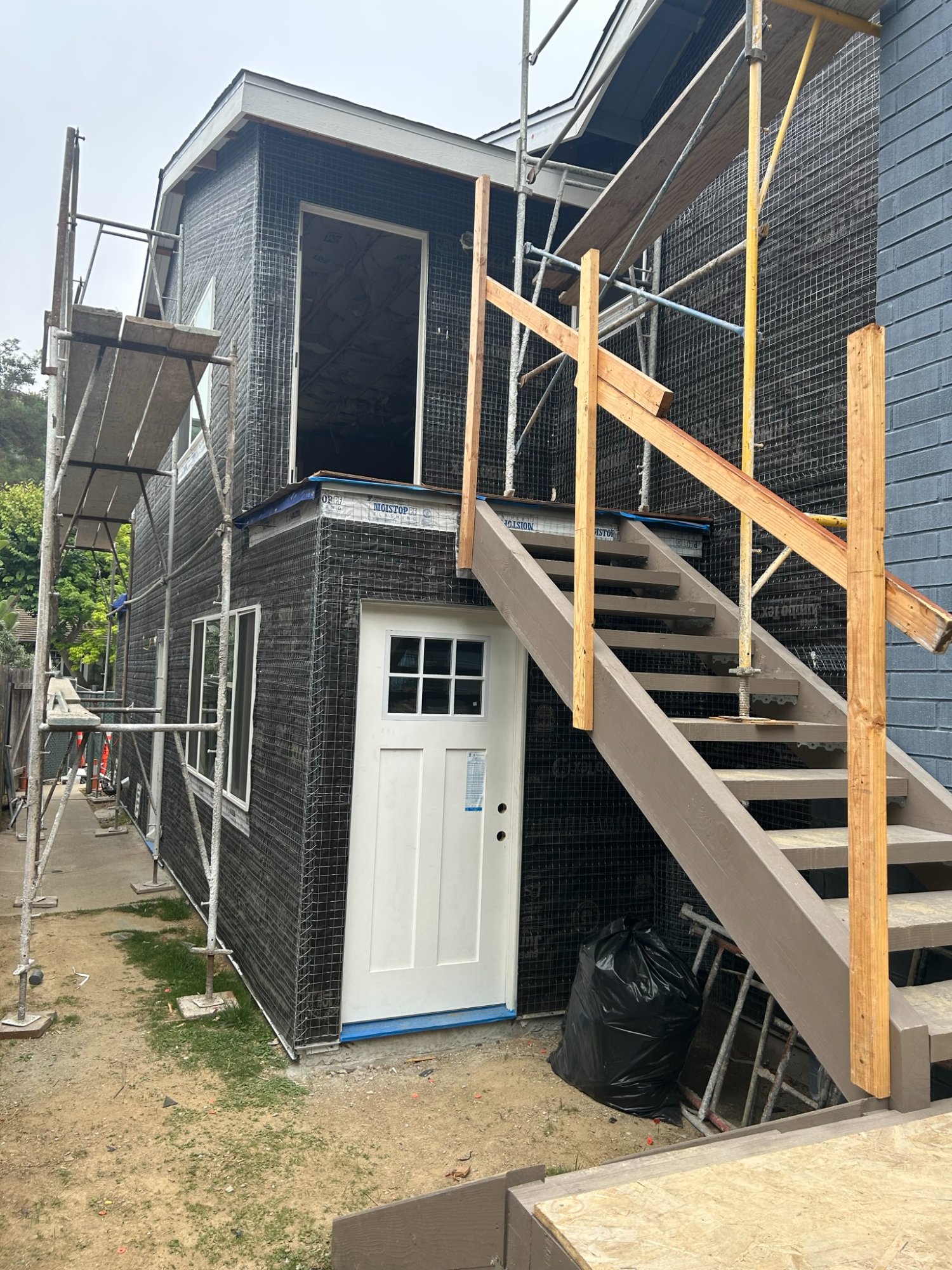 Room addition staircase and door install San Diego - Complete Builders Inc